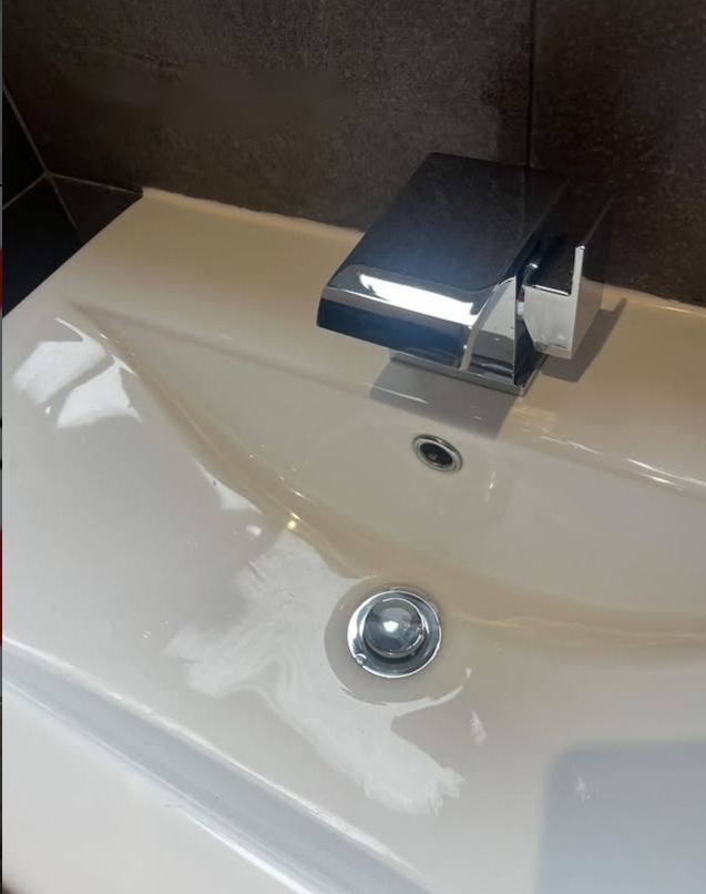 Gleaming chrome tap after cleaning