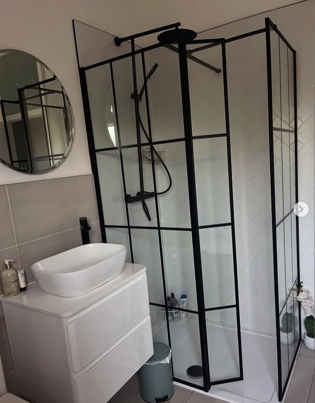 The same home's black-framed shower room