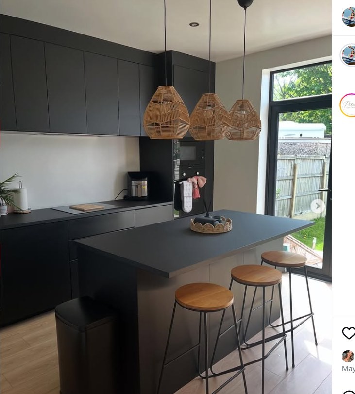 The same matte black kitchen, second view