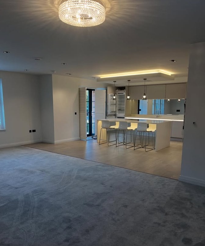 Luxury Wilmslow apartment lounge with chandelier